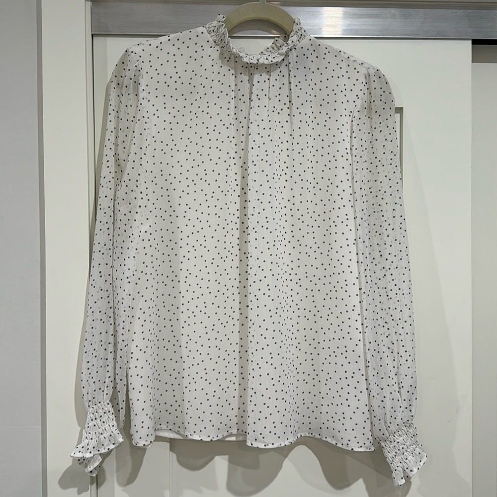 White polka dot blouse